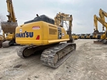 Used Excavator for Sale,Back corner of used Komatsu,Side of used Komatsu Excavator in yard